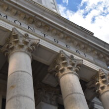 Image 5: Looking up at the capital and cornice details of Winnipeg’s downtown Bank of Montreal building.