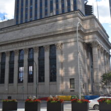 Image 7: Long vertical windows on the side of Winnipeg’s downtown Bank of Montreal building.