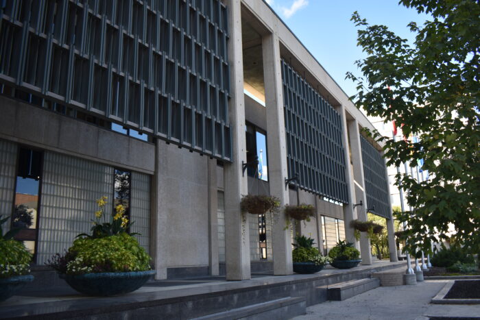 Winnipeg’s City Hall Council Building with planters along the facade.