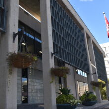 Image 1: Close up of the facade of City Hall