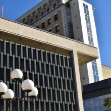 Image 6: Architectural details on the facade of City Hall with a lamp post in view