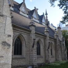 Image 11: Looking at side facade with three roof dormers