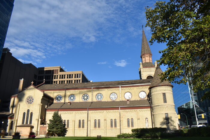 A side facade of St. Mary’s Cathedral. Landscaping grows in front of the facade.