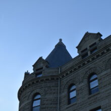 Image 2: Looking up at the west turret of the Wesley Hall building