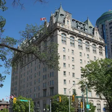 North-east side of Fort Garry Hotel along Broadway Avenue.