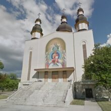 Image 1: Holy Trinity Ukrainian Orthodox Metropolitan Cathedral with a large mosaic on the front facade.