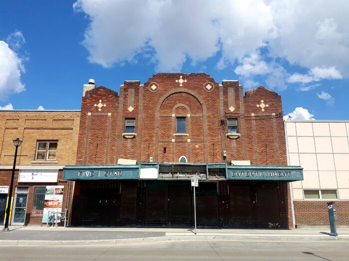 The Palace Theatre with “FIVE STAR ENTERTAINMENT” written along the edge of the marquee.